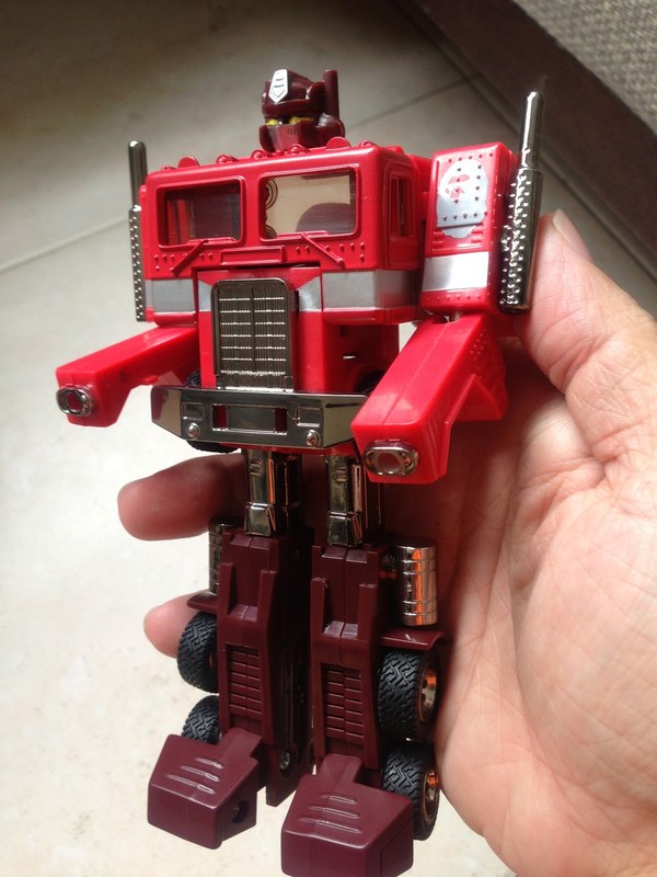 BAPE Red Cammo Convoy Exclusive Optimus Prime Figure Out The Box Image  (31 of 41)